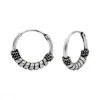 Zilveren Bali hoops, getwijnd met lange spiraal