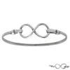 Zilveren bangle armband met infinity teken