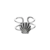Zilveren ear cuff met schelp