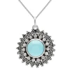Zilveren ketting met hanger, zon met turquoise steen en rijk bewerkte rand