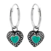 Zilveren oorringen met hanger, bewerkt hart met turquoise steen