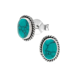 Zilveren oorstekers, ovale turquoise steen met bewerkte rand