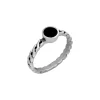 Zilveren ring, vlecht met onyx