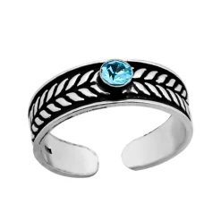 Zilveren teenring, geoxideerd zilveren bandje met bladdesign en blauwe kristal