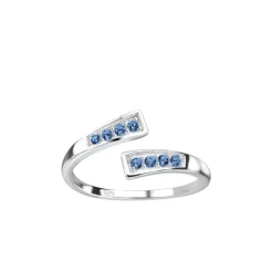 Zilveren teenring, opengewerkt met blauwe kristallen